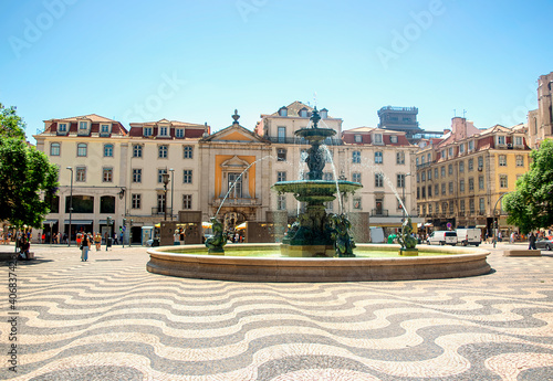 Rossio square with a fountain in Lisbon, Portugal. photo