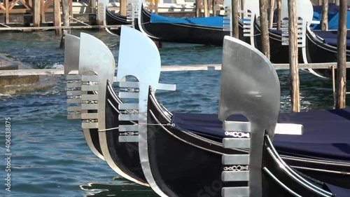 Venice, gondolas parked on the riva degli schiavoni near Piazza San Marco photo