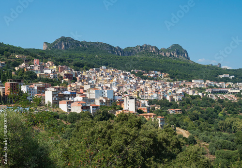 Cityscape of old pictoresque colorful village Jerzu with limestone rocks, mountains and green forest vegetation. Summer sunny day. Province of Nuoro, Sardinia, Italy, Europe © Kristyna