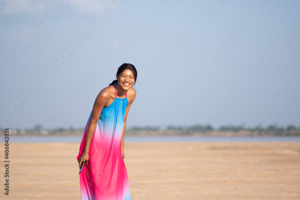 beautiful african lady feeling happy and excited at the beach beautiful african lady feeling happy and excited at the beach