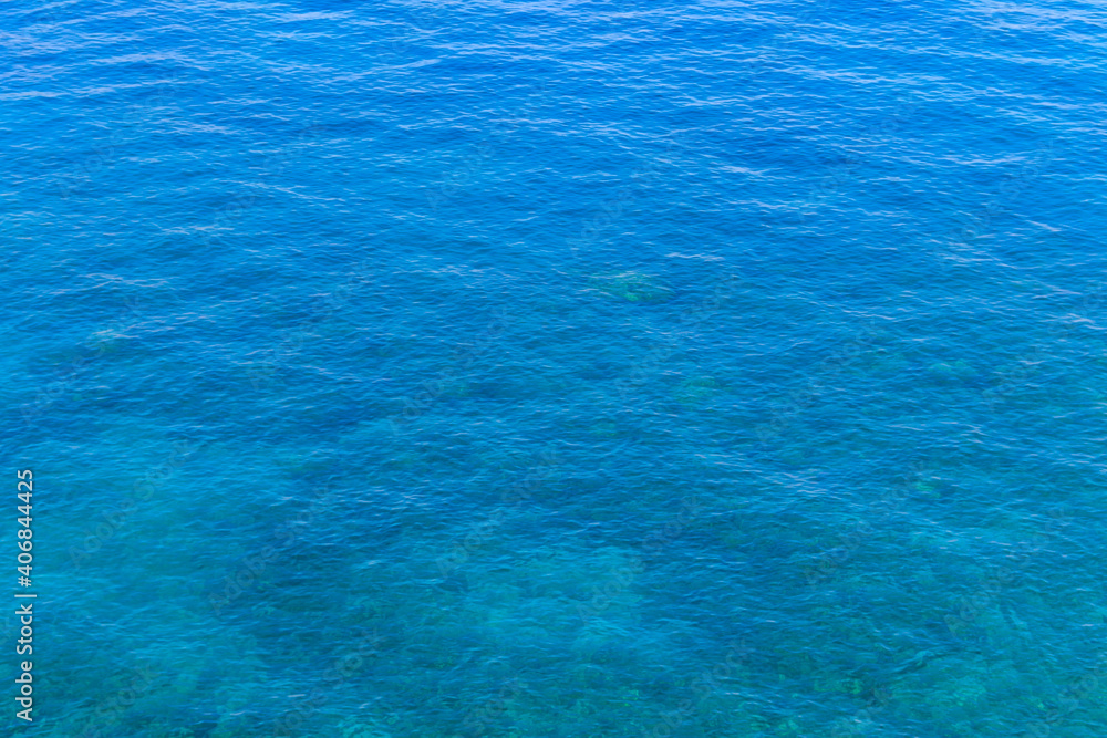 Blue water texture background. Surface of the sea