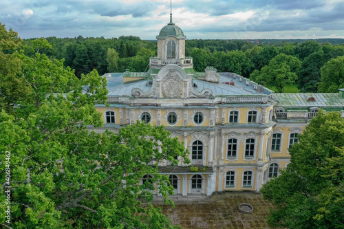Aerial view of the facade of the Znamenka estate palace on a sunny summer day. Znamensky palace in Peterhof. Russia, Peterhof, 07.20.2020