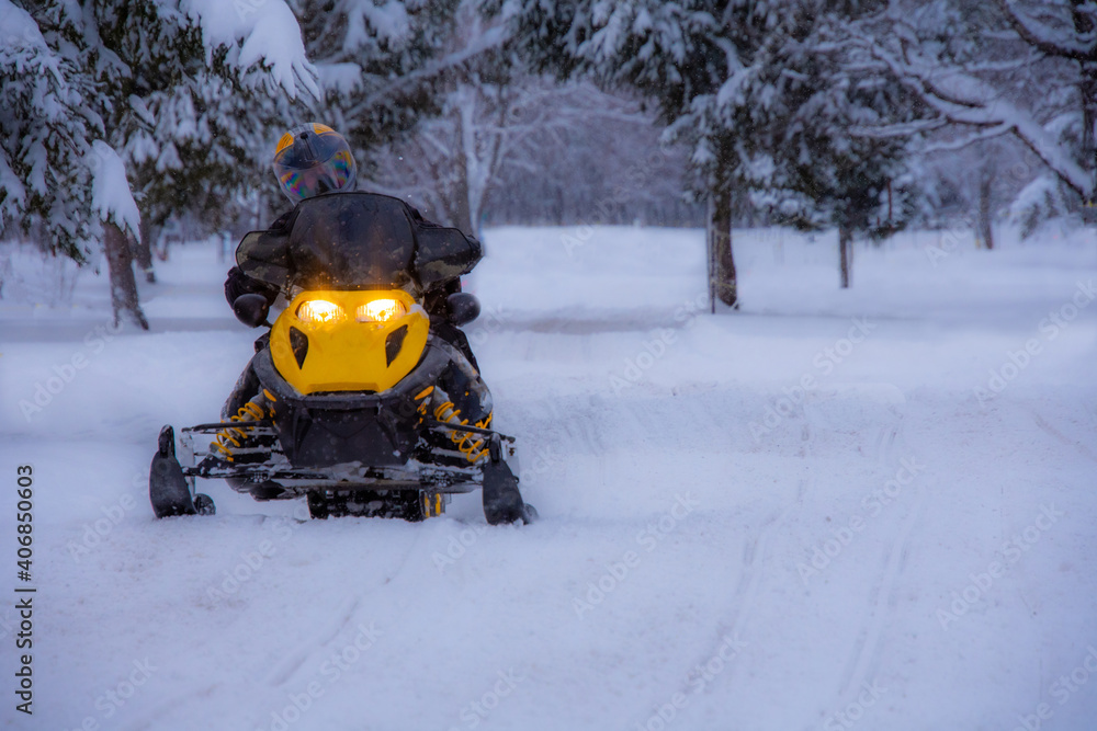 Snowmobile in the Canadian winter Snowmobile in the Canadian winter