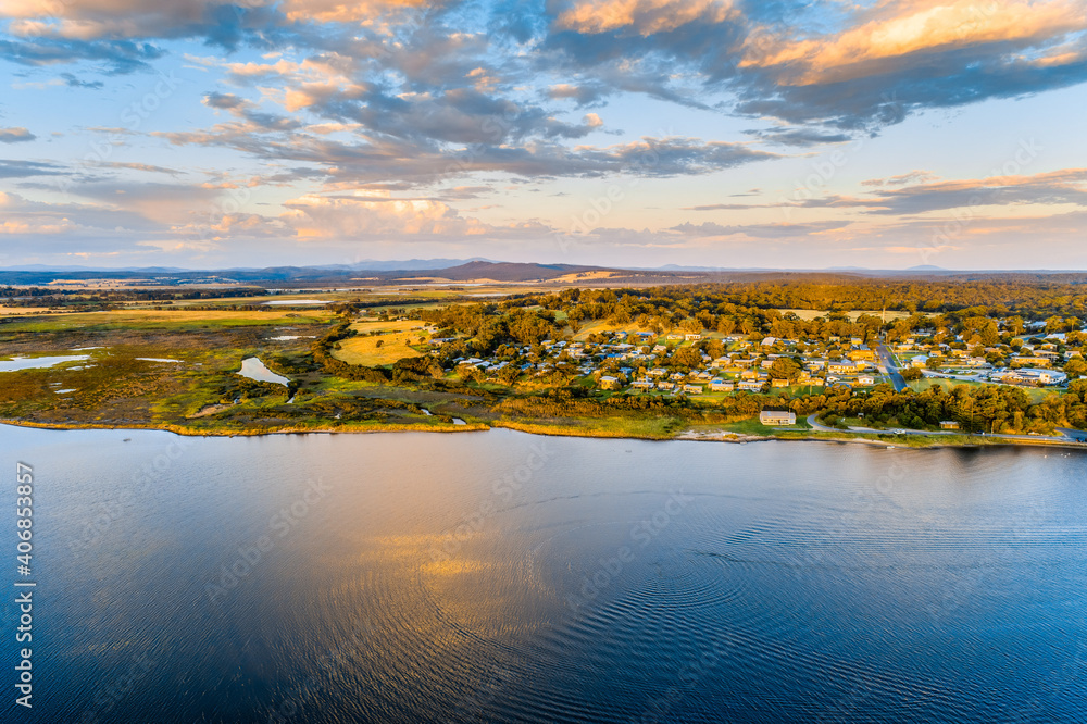 Scenic township of Marlo on the banks of Snowy River at sunset - aerial view