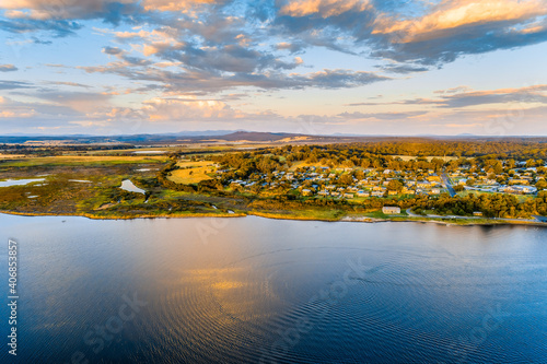 Scenic township of Marlo on the banks of Snowy River at sunset - aerial view