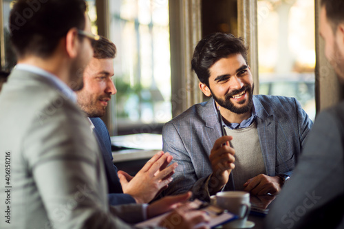 Group of businessmen have a talk