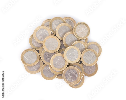 A pile of euro coins on a white background