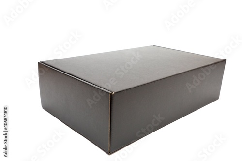 Unopend black cardboard box on white background