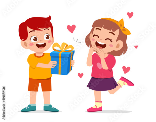 cute boy give present to little girl for celebrate birthday