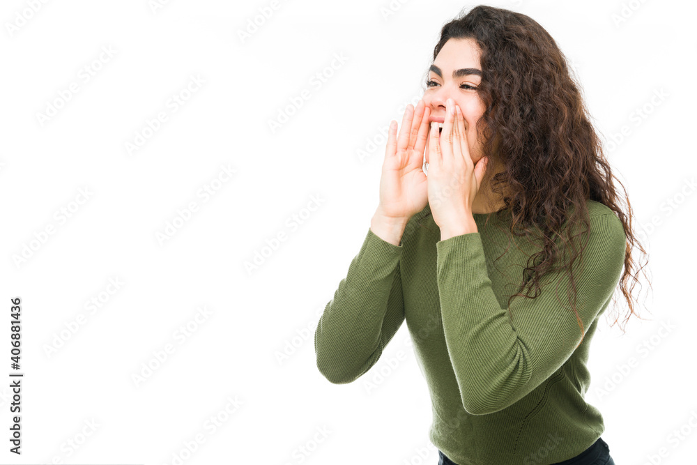 Latin woman screming and calling loud to her friends Latin woman screming and calling loud to her friends