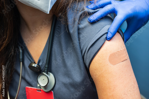 female healthcare worker received the coronavirus vaccine 