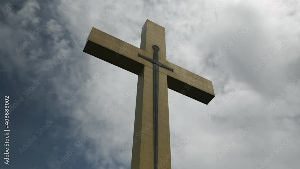 Memorial cross in sky with clouds Memorial cross in sky with clouds