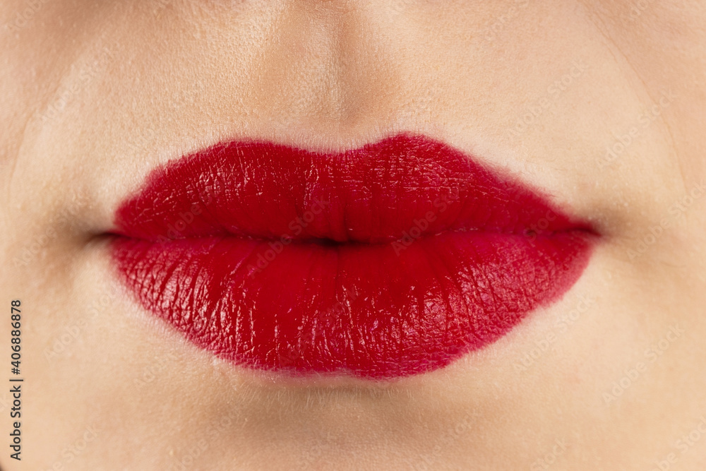 Close-up lips of young beautiful woman. Sexy red lips. Lip Makeup. Glossy red lipstick. Panoramic shot. Close-up macro shot. High quality image. Panorama banner. Close-up lips of young beautiful woman. Sexy red lips. Lip Makeup. Glossy red lipstick. Panoramic shot. Close-up macro shot. High quality image. Panorama banner.
