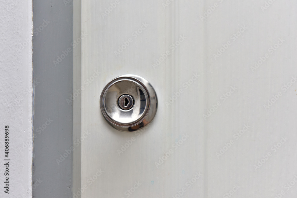 Stainless steel knob with white house door. Stainless steel knob with white house door.