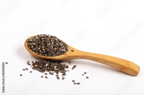 chia seeds in wooden spoon Isolated on white background