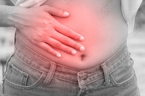 Wallpaper Mural The woman pat strokes herself on the abdomen. Torontodigital.ca