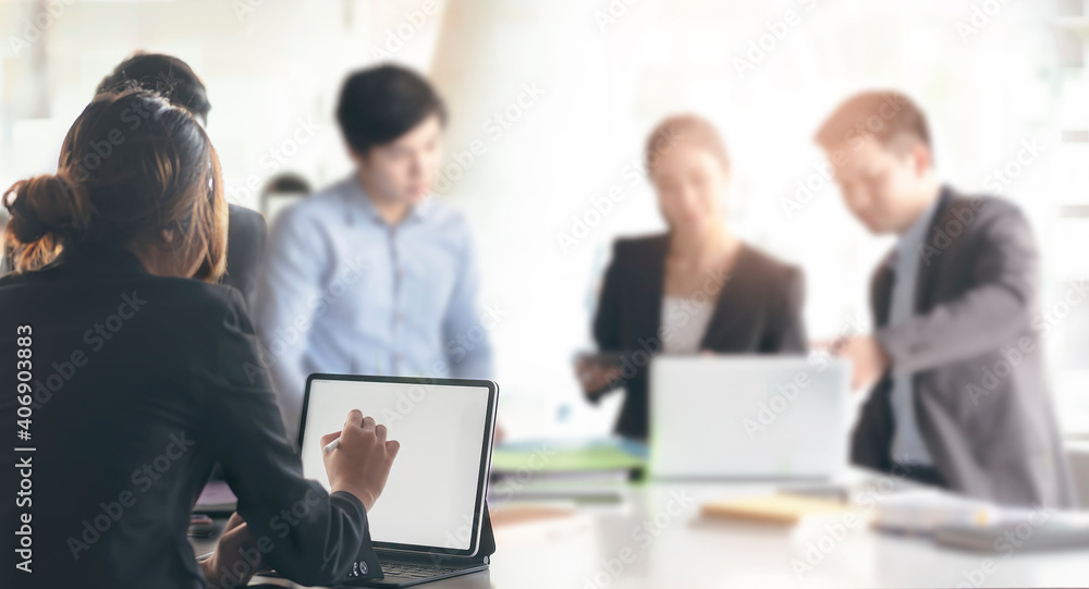 Group of business people working together in office room. Group of business people working together in office room.