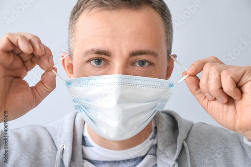Mature man wearing medical ...