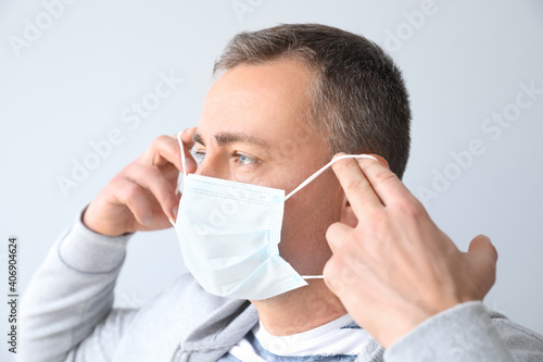 Mature man wearing medical ...