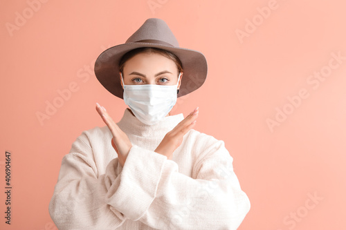 Young woman in medical mask...