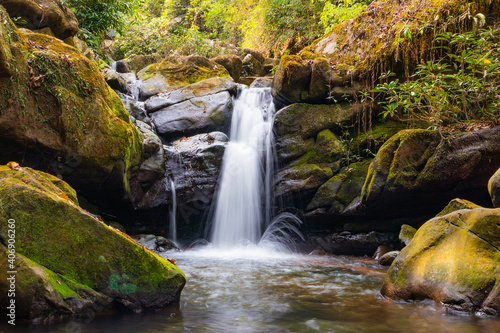 Fototapeta Naklejka Na Ścianę i Meble -  Beautiful waterfall deep in the tropical forest.