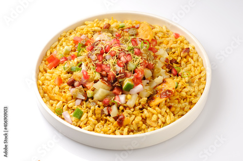 Bhel puri in a plate, bhelpuri is an Indian snack, a street food made from vegetables and puffed rice as the main ingredient