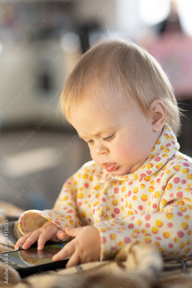 Baby one year old plays