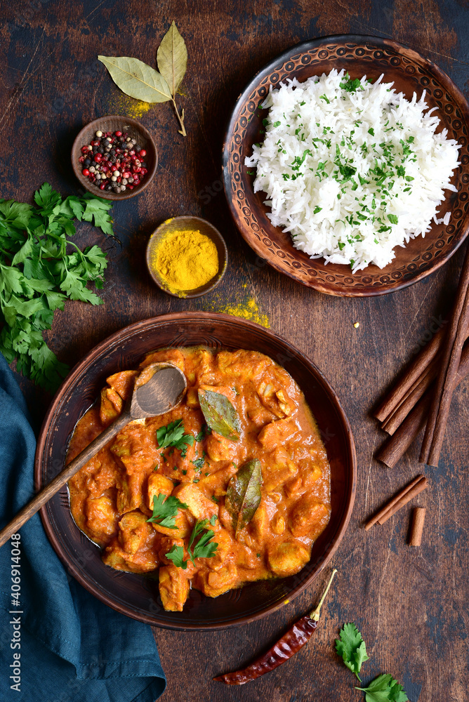 Spicy chicken tikka masala with bioled rice . Top view with copy space. Spicy chicken tikka masala with bioled rice . Top view with copy space.