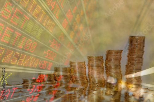 Gold coin showing an increasing graph