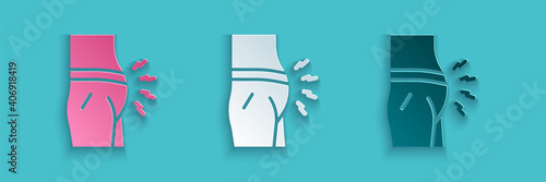 Paper cut Abdominal bloating icon isolated on blue background. Constipation or diarrhea. Paper art style. Vector.
