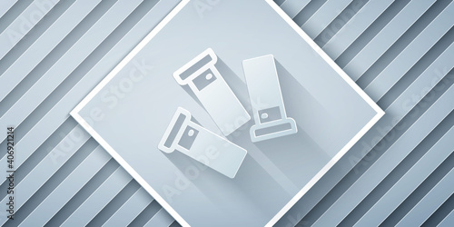 Paper cut Cartridges icon isolated on grey background. Shotgun hunting firearms cartridge. Hunt rifle bullet icon. Paper art style. Vector.