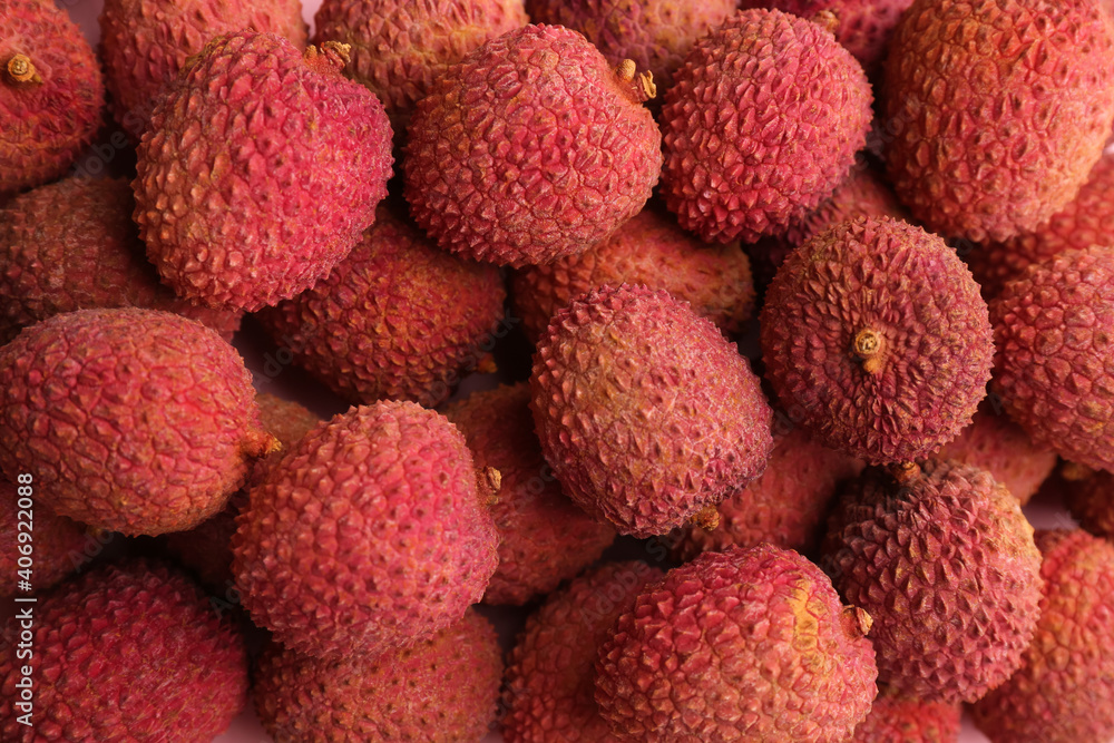 Pile of fresh ripe lychees as background, top view Pile of fresh ripe lychees as background, top view