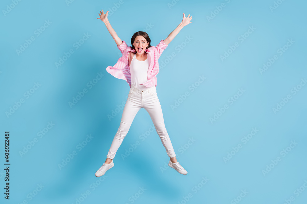 Full body photo of impressed cheerful lady jump high star figure open mouth isolated on blue color background