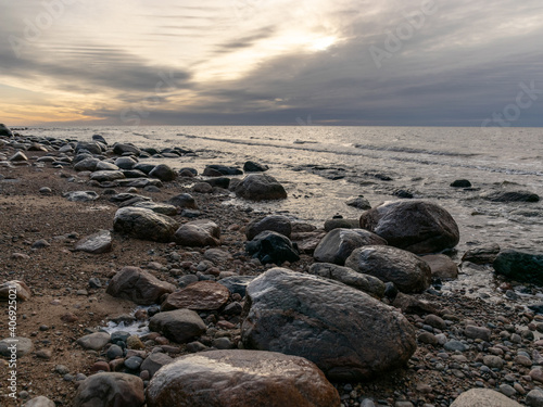 landscape with a rocky beach in the evening