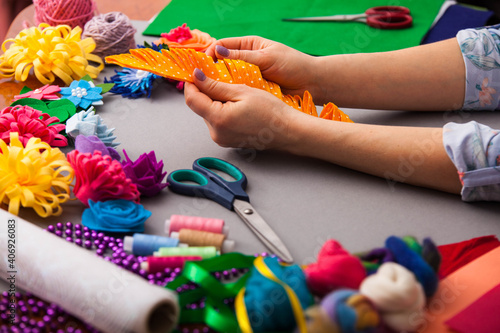 Wallpaper Mural Woman modelling artificial flower from clay Torontodigital.ca