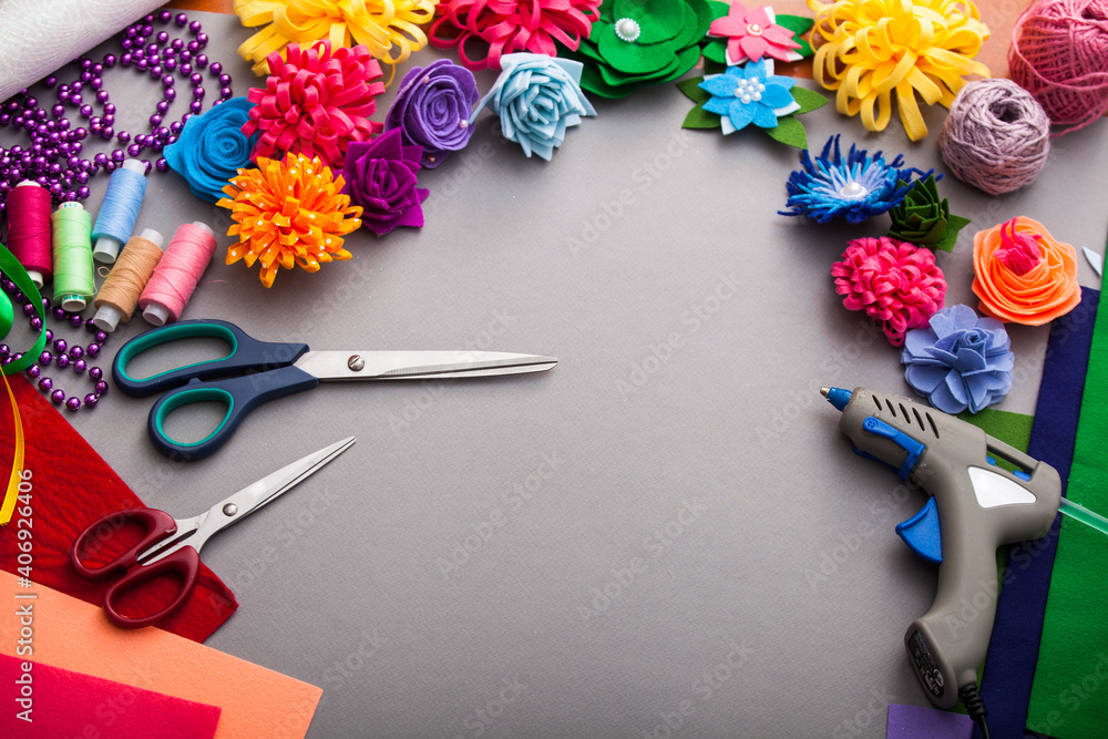 Obraz premium Woman modelling artificial flower from clay