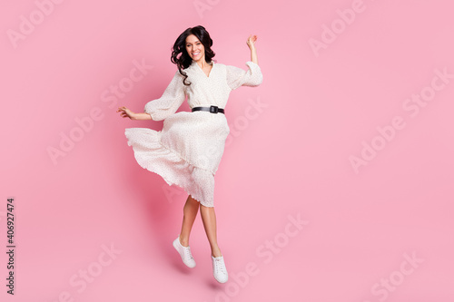 Leinwand Poster Full length body size photo of girlish cheerful woman in long dress jumping step