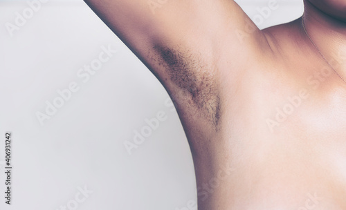 Women have lot of Hairy armpits black and long. photo