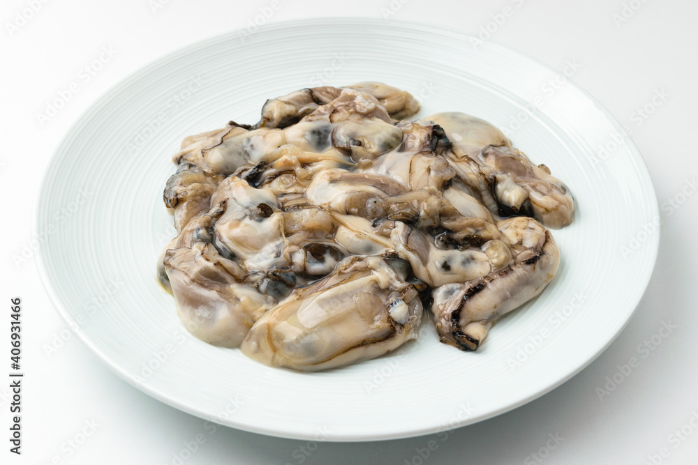 Raw oysters on a white background Raw oysters on a white background