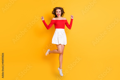 Photography Full length body size photo smiling girl wearing red top white skirt jumping hig