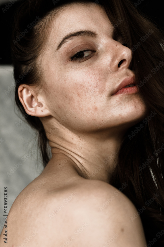 portrait of a woman without makeup and retouching