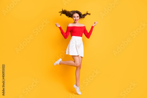 Full length body size photo of pretty girl wearing white skirt red off-shoulders top smiling isolated on bright yellow color background