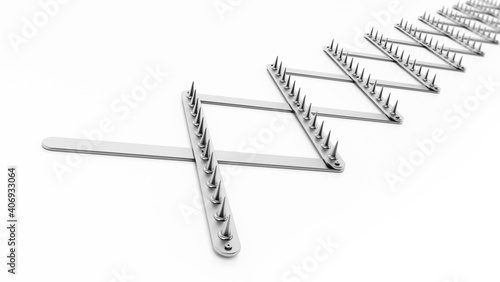 Valokuva Road spike or tire trap isolated on white background