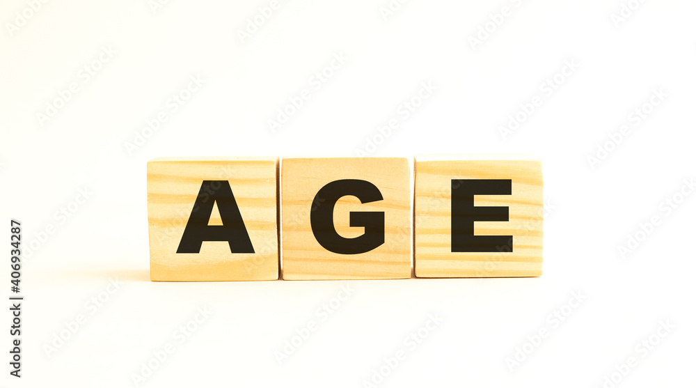 The word AGE. Wooden cubes with letters isolated on white background. The word AGE. Wooden cubes with letters isolated on white background.