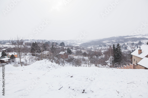Rural winter landscape of snowy day, village in the Serbia
