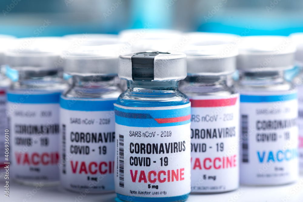 virus vaccine development of a coronavirus COVID-19, vaccine bottle in concept of insurance and fight against coronavirus 2019 ncov cure, medical research in laboratory to stop the spread of the virus virus vaccine development of a coronavirus COVID-19, vaccine bottle in concept of insurance and fight against coronavirus 2019 ncov cure, medical research in laboratory to stop the spread of the virus