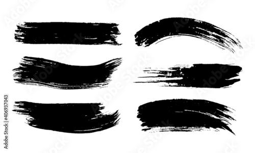set of black ink strokes on white paper. Graphic design elements for lower third, text effect, photo pverlay, etc. Chinese style abstract brush strokes