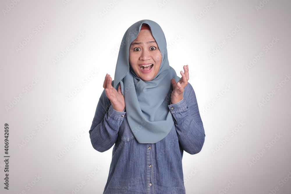 Shocked Worried Asian Muslim Woman With Mouth Opened Shocked Worried Asian Muslim Woman With Mouth Opened