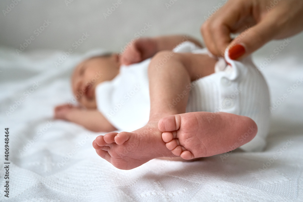 One week newborn adorable innocent baby lying at baycot and funny yawning.Portrait of sleepy caucasian infant tired child on bed. High quality photo One week newborn adorable innocent baby lying at baycot and funny yawning.Portrait of sleepy caucasian infant tired child on bed. High quality photo
