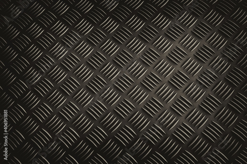 Dark metallic diamond pattern texture background.